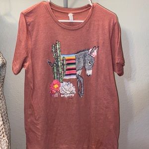 graphic tee and gray cardigan